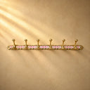 Handcrafted Moroccan brass coat rack with soft pink resin diamond inlay and 6 hooks. Pretty wall hooks for bedroom, bath, or entry.