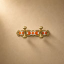 Moroccan brass rack with warm orange resin inlay and 2 hooks. Handmade wall-mounted coat and towel hooks. Each piece one of a kind.
