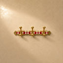  Moroccan brass coat rack with red-and-white resin inlay and 3 hooks. Handmade wall-mounted hooks for entryway or bathroom.