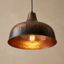 A handcrafted hammered brass pendant light featuring a wide dome shade, warm antique finish, and exposed Edison bulb. Perfect for kitchen islands, dining rooms, entryways, and modern rustic interiors.
