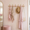 Handmade 6-hook solid brass coat rack featuring pink and white resin inlay, polished brass double hooks, and decorative Moroccan wall-mounted storage for entryways, hallways, bathrooms, and mudrooms.